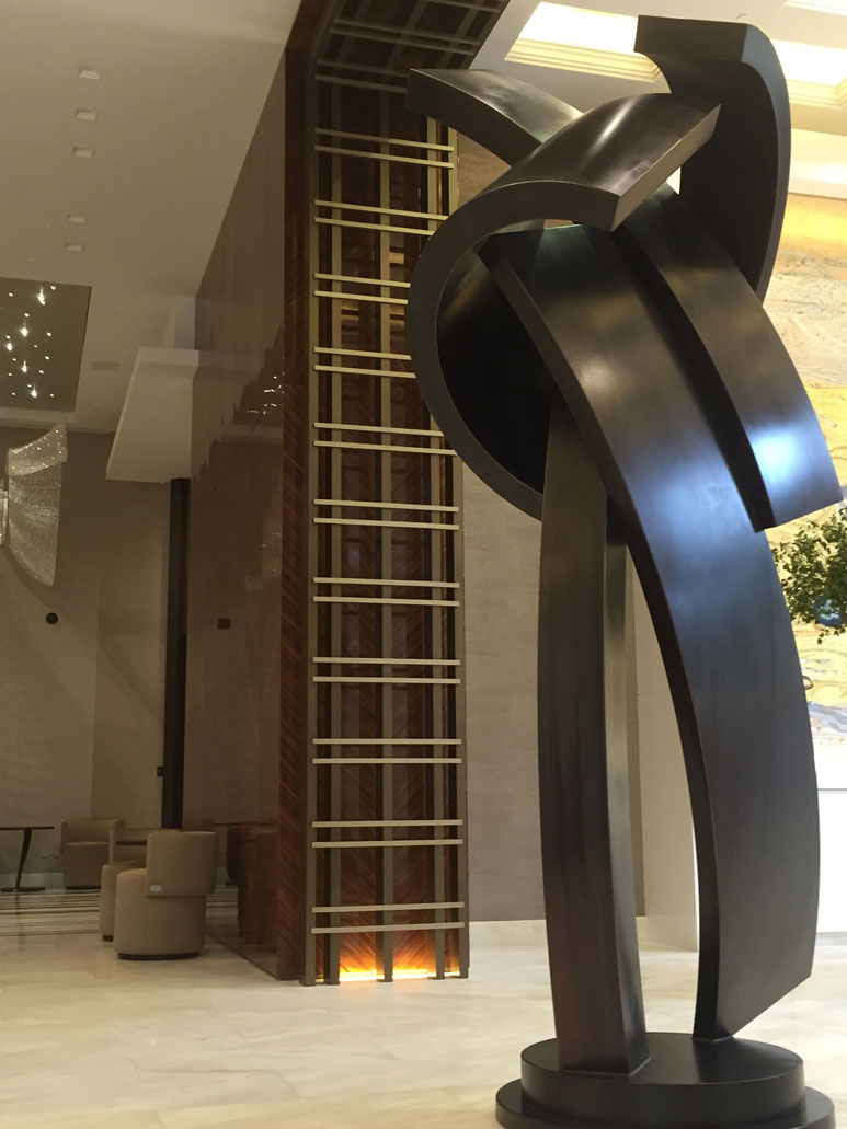 photo of an iron sculpture in a lobby