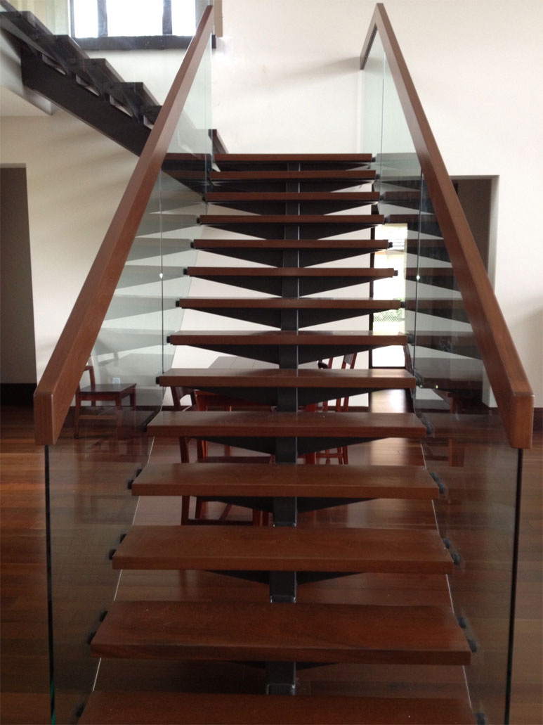 photo of a modern wooden and glass staircase